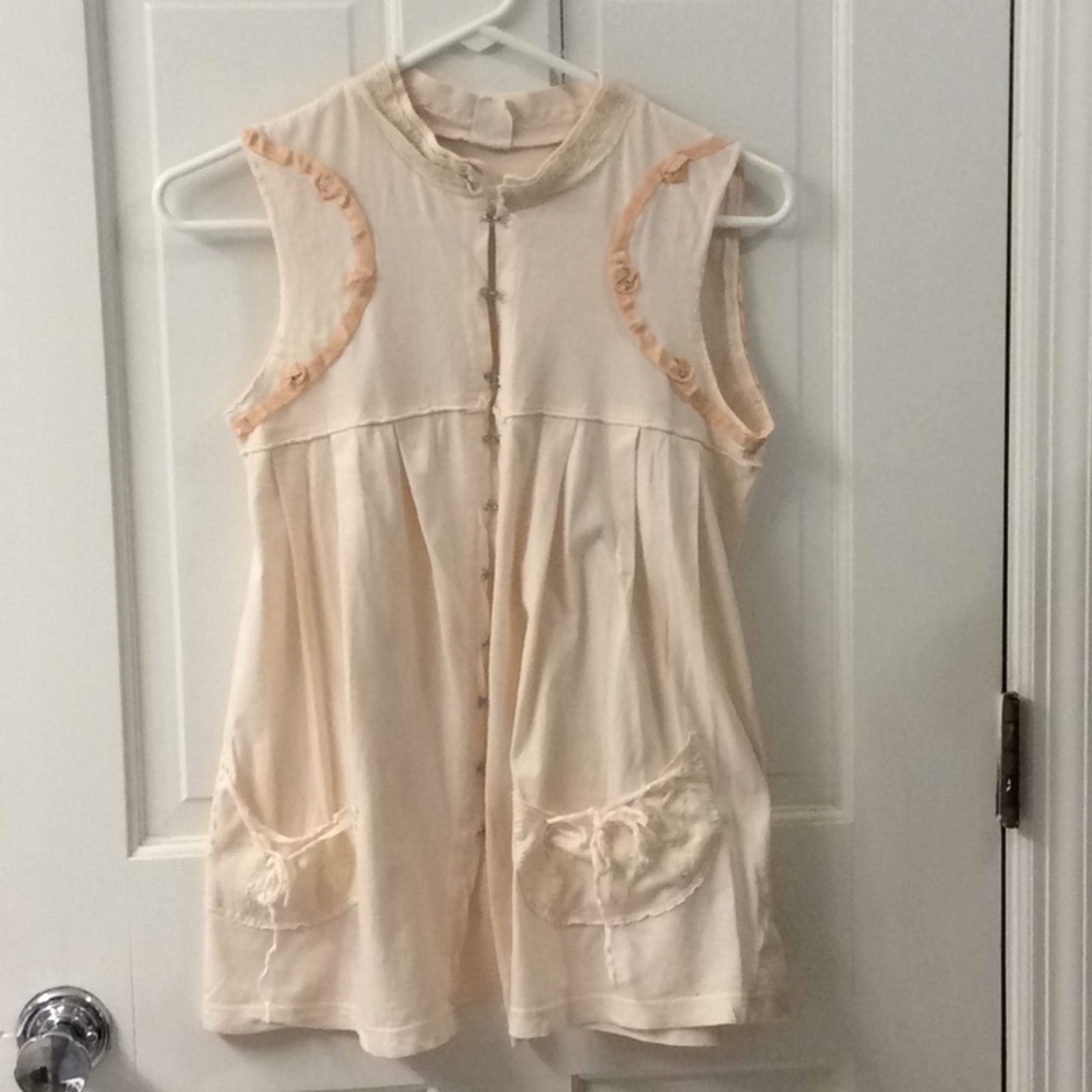 Free People size small peach knit top.